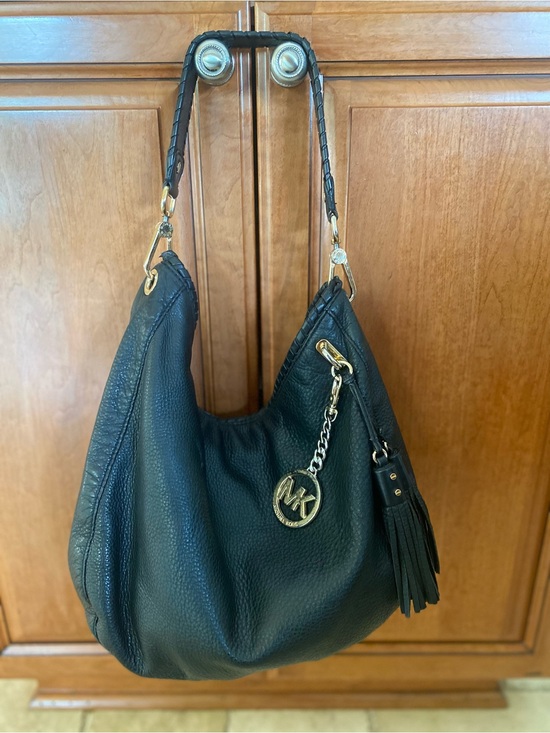 Michael Kors Handbags - Michael Kors Black Pebbled Leather Hobo with Gold Hardware and Tassel Charm